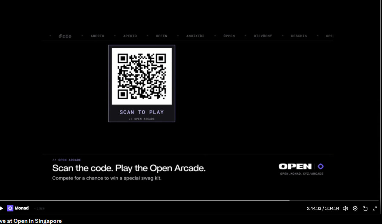Monad livestream frame showing the Open Arcade QR code: Scan the code. Play the Open Arcade.